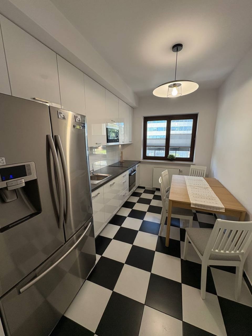 Deluxe Apartment, Balcony, City View | Private kitchen | Electric kettle, highchair, cleaning supplies, freezer