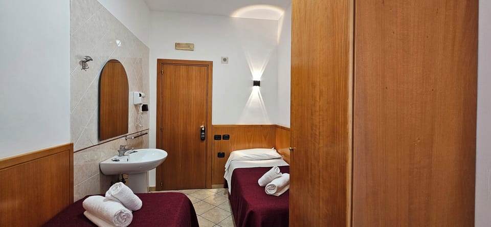 Standard Twin Room, Shared Bathroom | Hypo-allergenic bedding, in-room safe, desk, free WiFi
