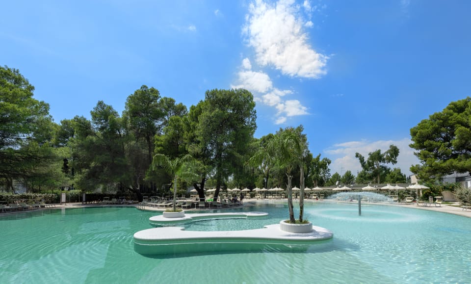 Indoor pool, seasonal outdoor pool, pool umbrellas, sun loungers