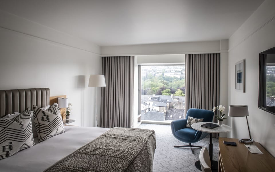 Deluxe Room, 1 King Bed | Hypo-allergenic bedding available, down comforters, pillowtop beds