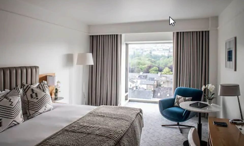 Deluxe Room, 1 King Bed | Hypo-allergenic bedding available, down comforters, pillowtop beds