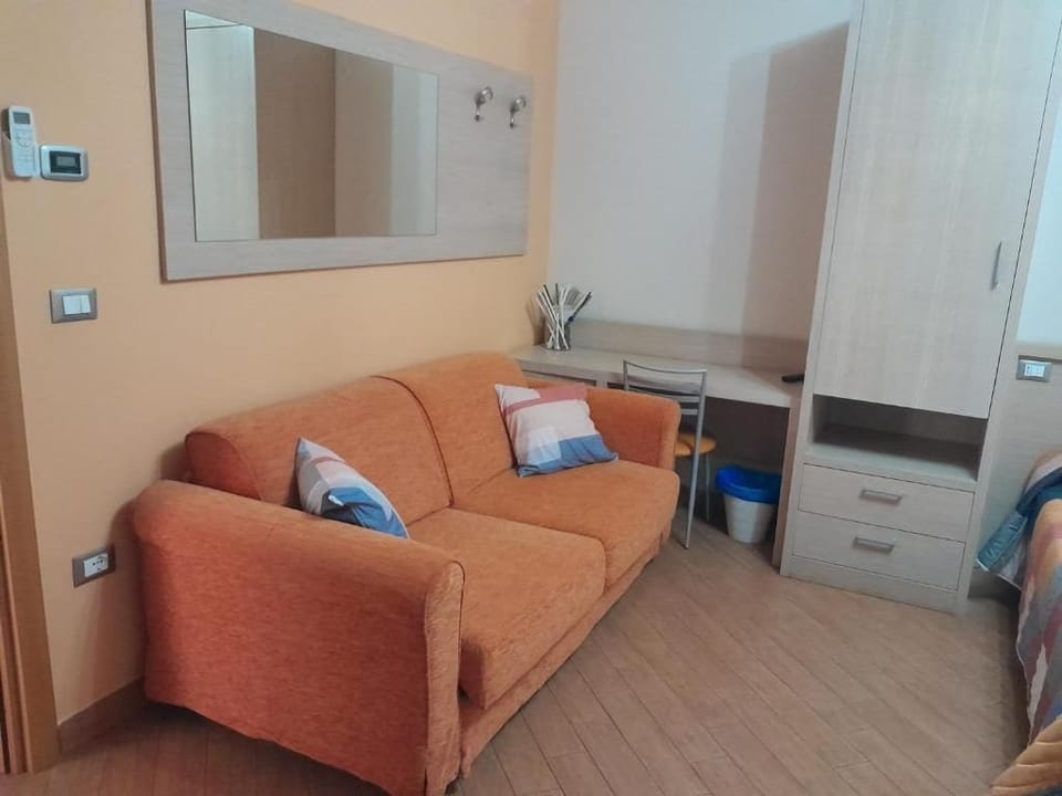 Family Quadruple Room | Living area