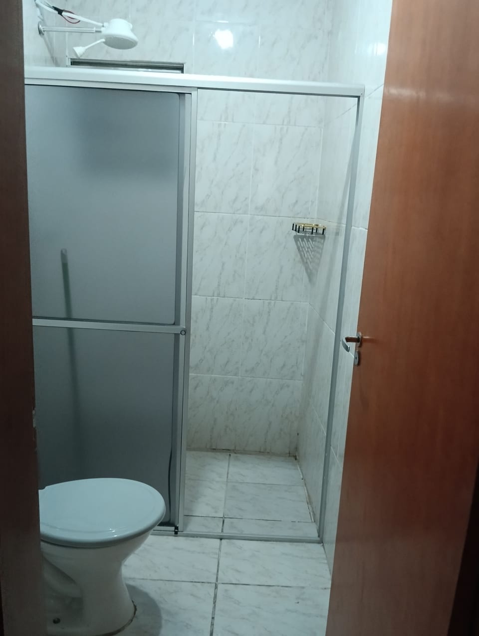 Shower, towels, soap, toilet paper