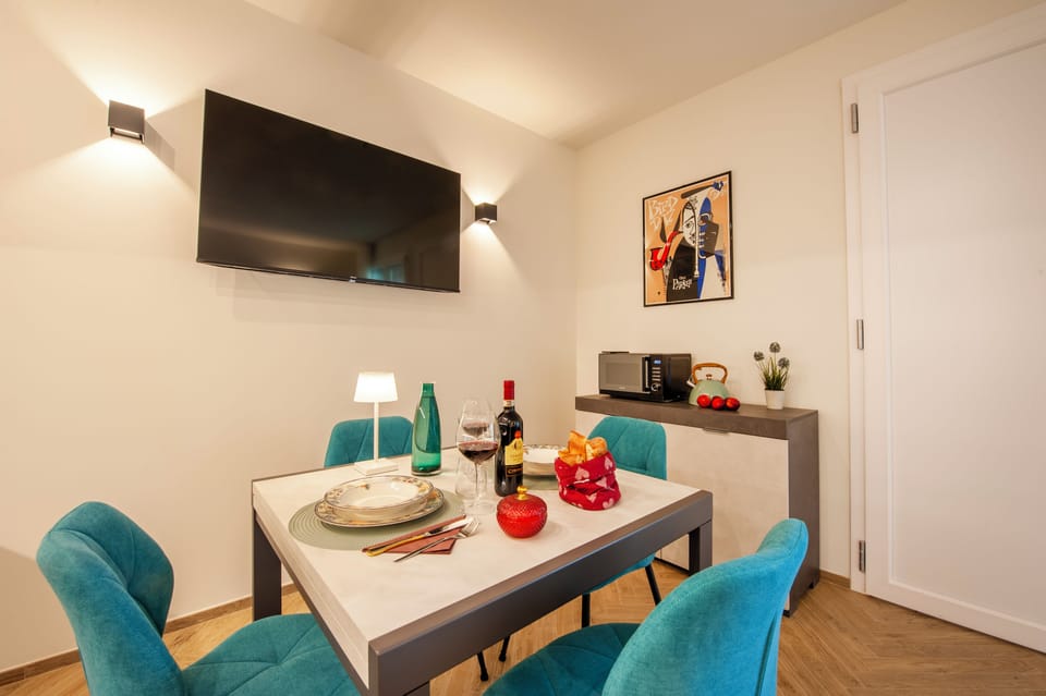 Apartment (1 Bedroom) | Living area | TV