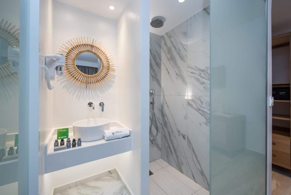 Shower, free toiletries, hair dryer, bathrobes
