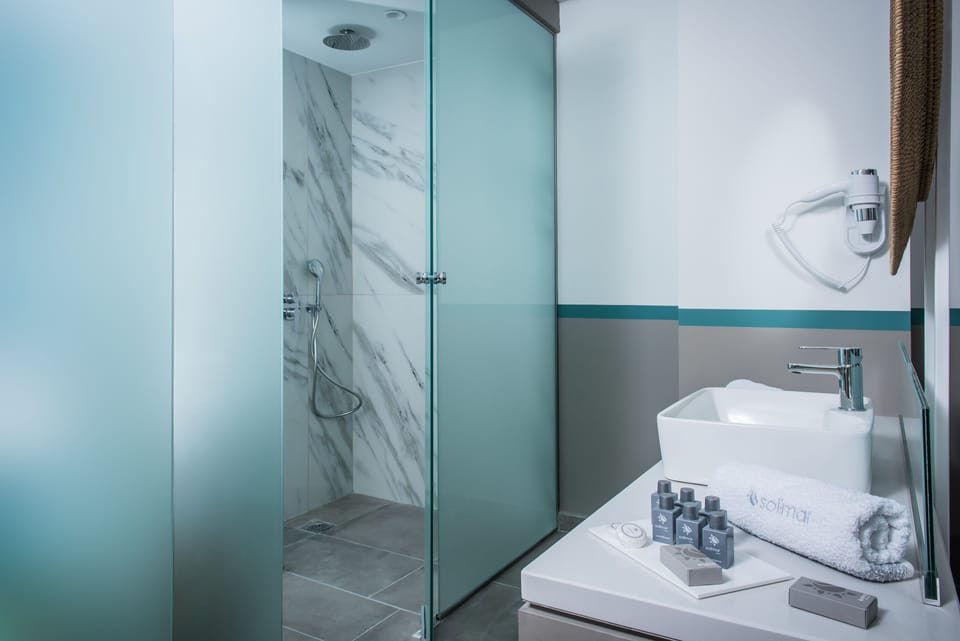 Shower, free toiletries, hair dryer, bathrobes