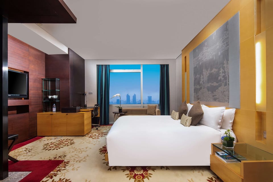 Deluxe Double Bed Room | Minibar, in-room safe, desk, blackout drapes