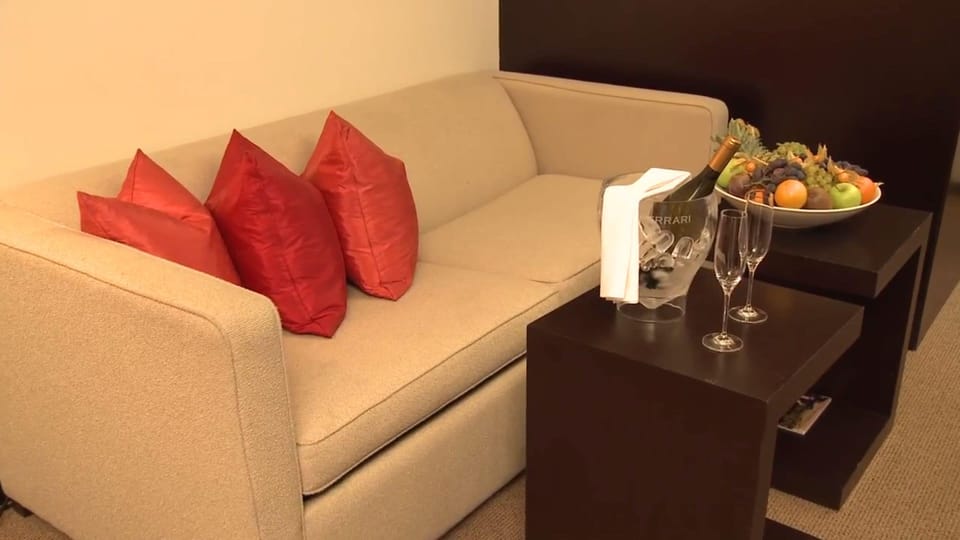 Junior Studio Suite | Living area | 55-inch Smart TV with satellite channels, TV, Netflix