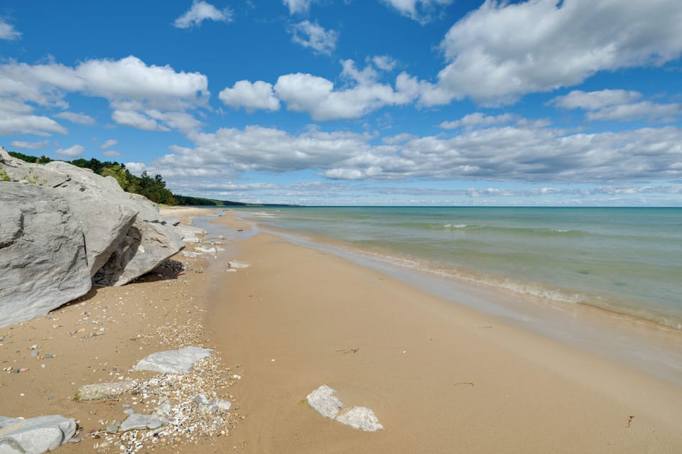 Lakefront Escape at Sunrise Side Resort Apartment in Michigan