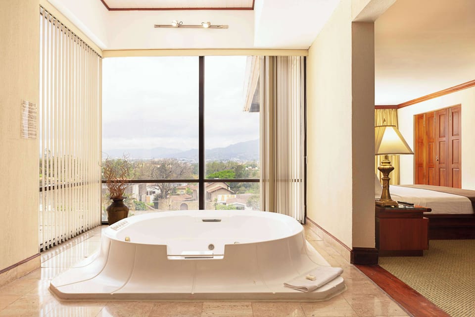 Combined shower/tub, deep soaking tub, free toiletries, hair dryer