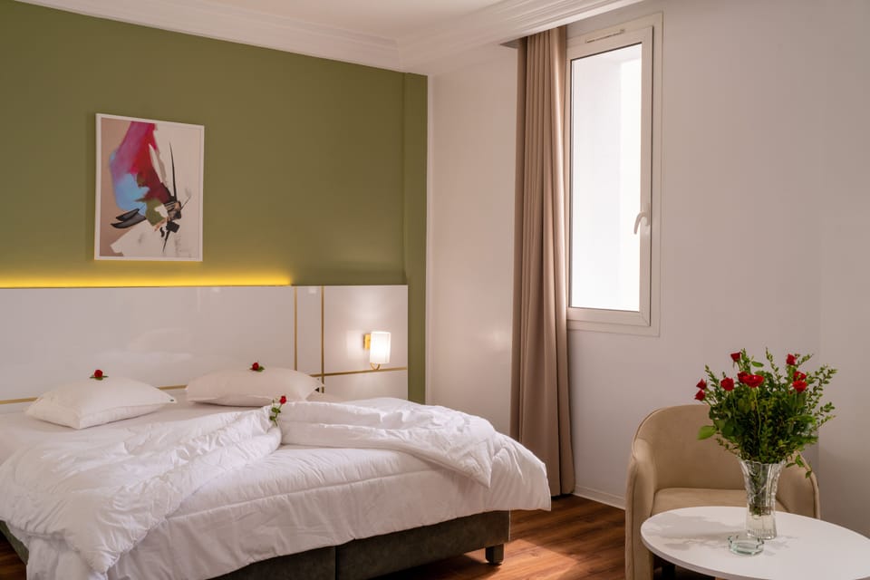 Family Triple Room, Multiple Beds | In-room safe, desk, laptop workspace, blackout drapes