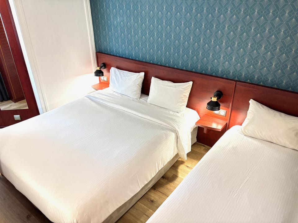 Standard Triple Room, Multiple Beds | Accessible bathroom
