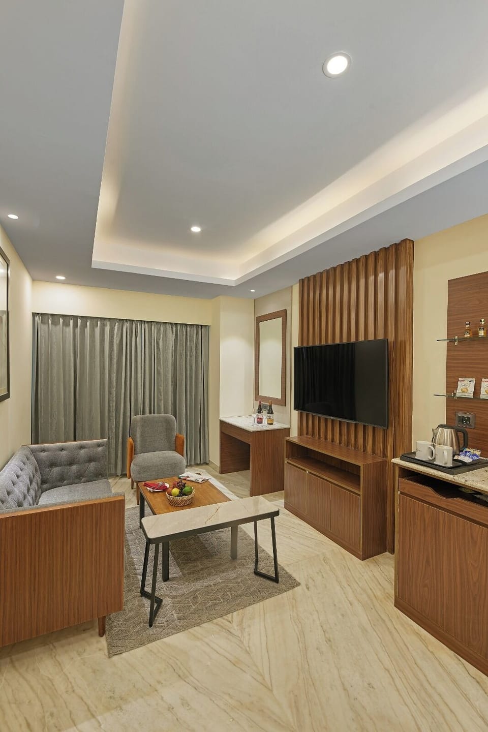 Executive Suite, 1 Double Bed | Living area | TV, fireplace, pay movies