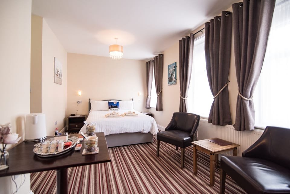 Double Room, 1 King Bed | Blackout drapes, iron/ironing board (on request), WiFi (free)
