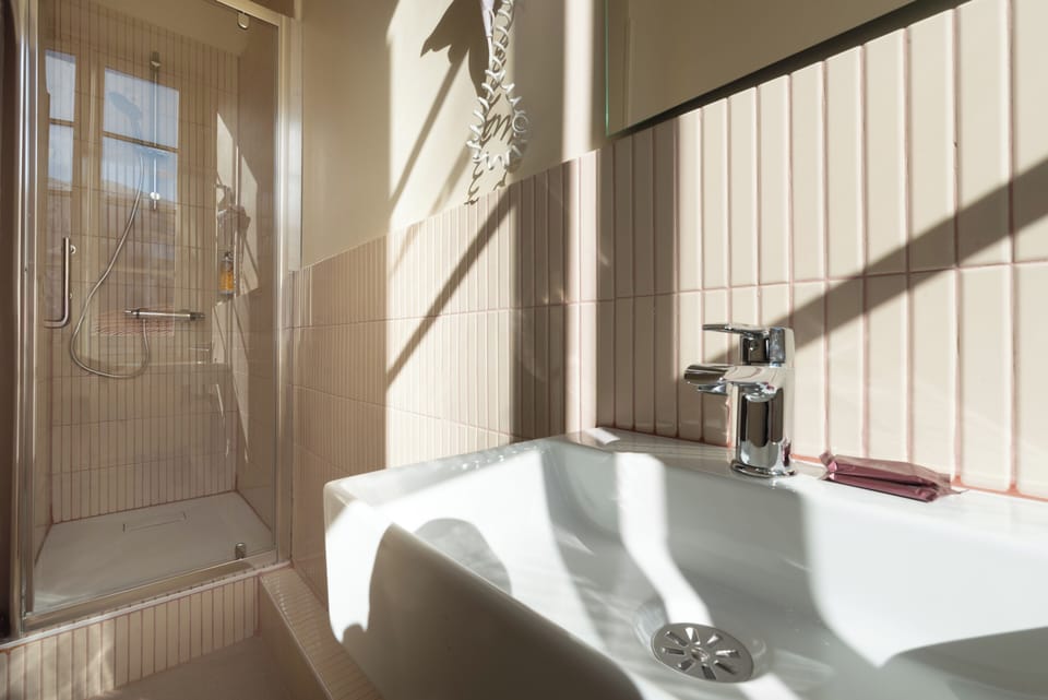 Twin Room | Bathroom | Hair dryer, towels