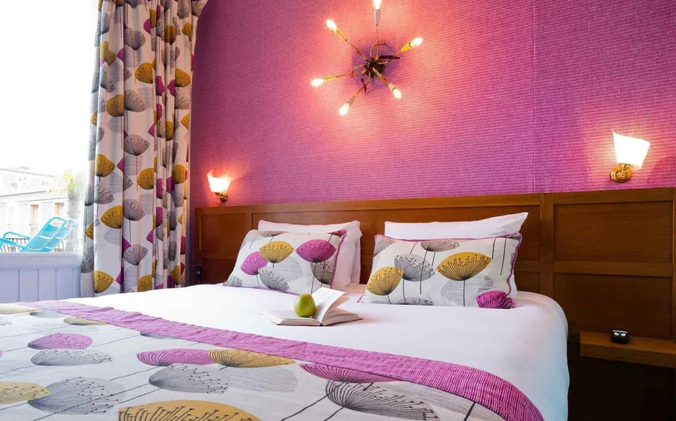 Premium bedding, desk, blackout drapes, soundproofing