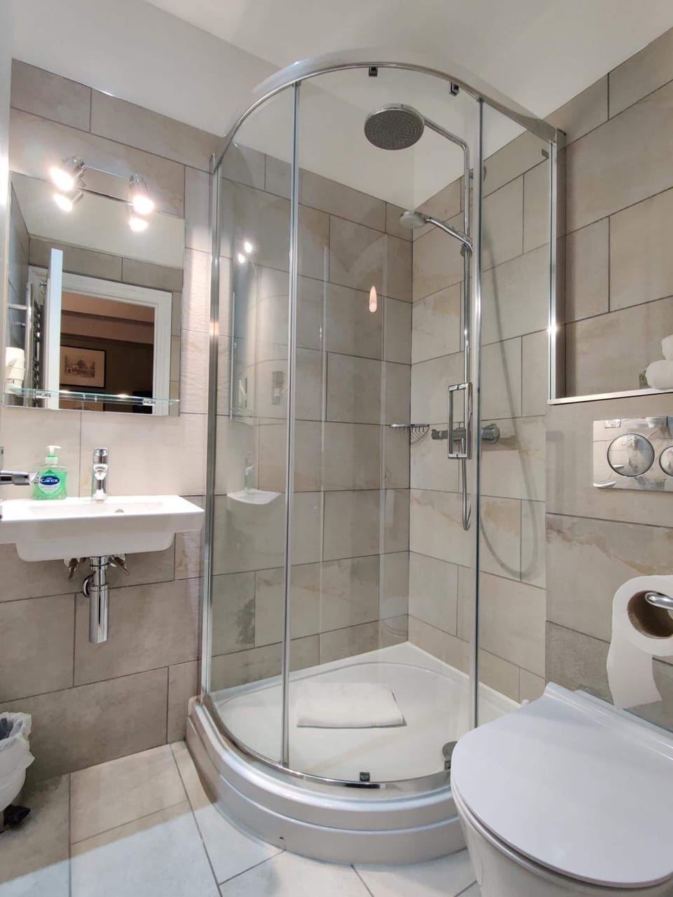 Shower, free toiletries, hair dryer, towels