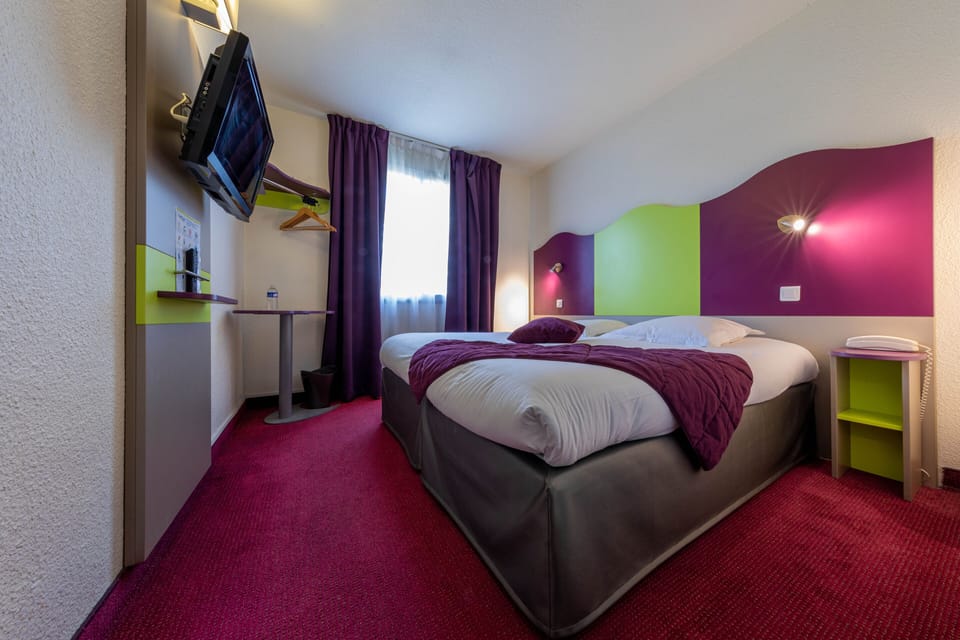 Family Quadruple Room | Premium bedding, blackout drapes, soundproofing, free cribs/infant beds