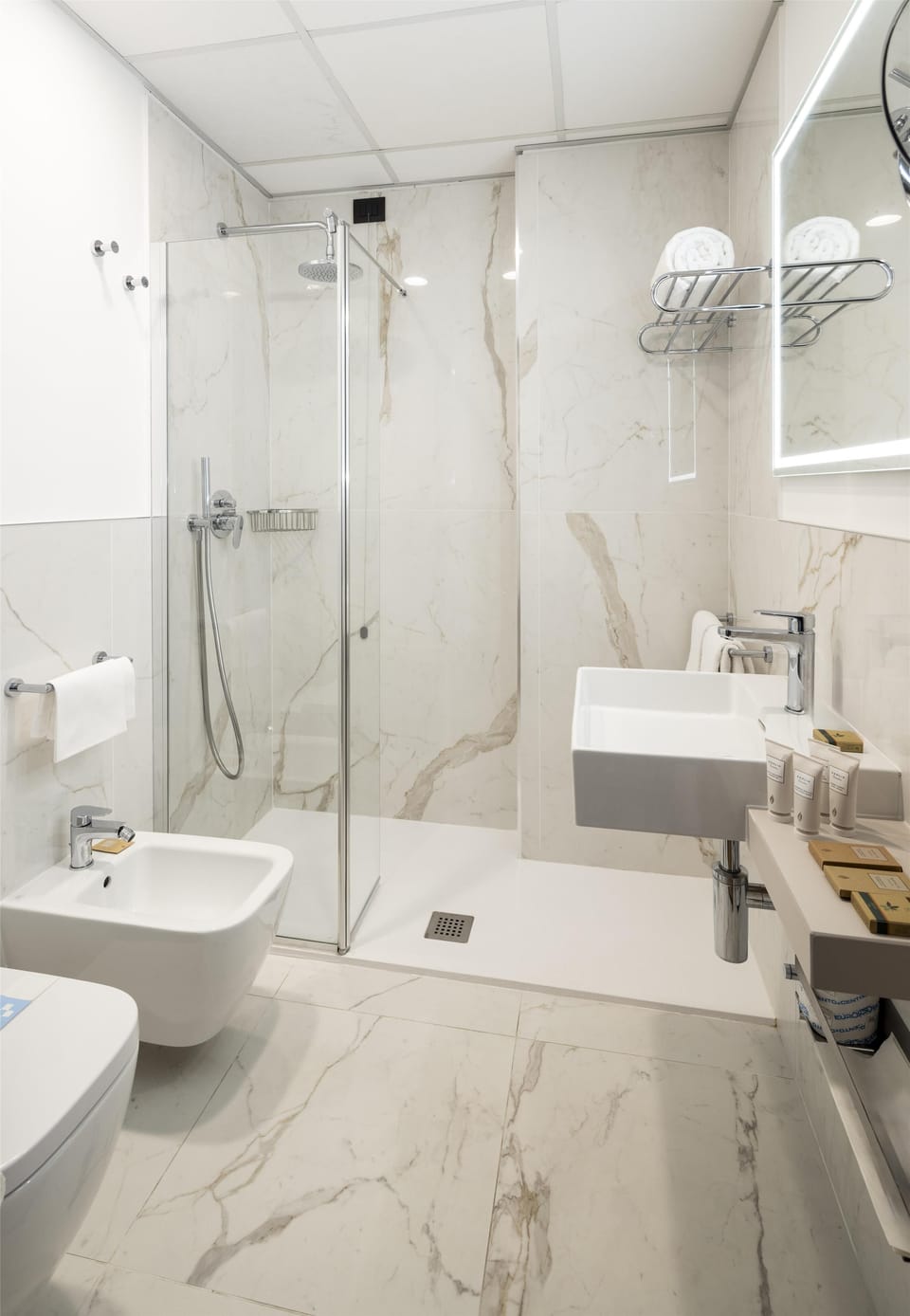 Combined shower/tub, eco-friendly toiletries, hair dryer, slippers