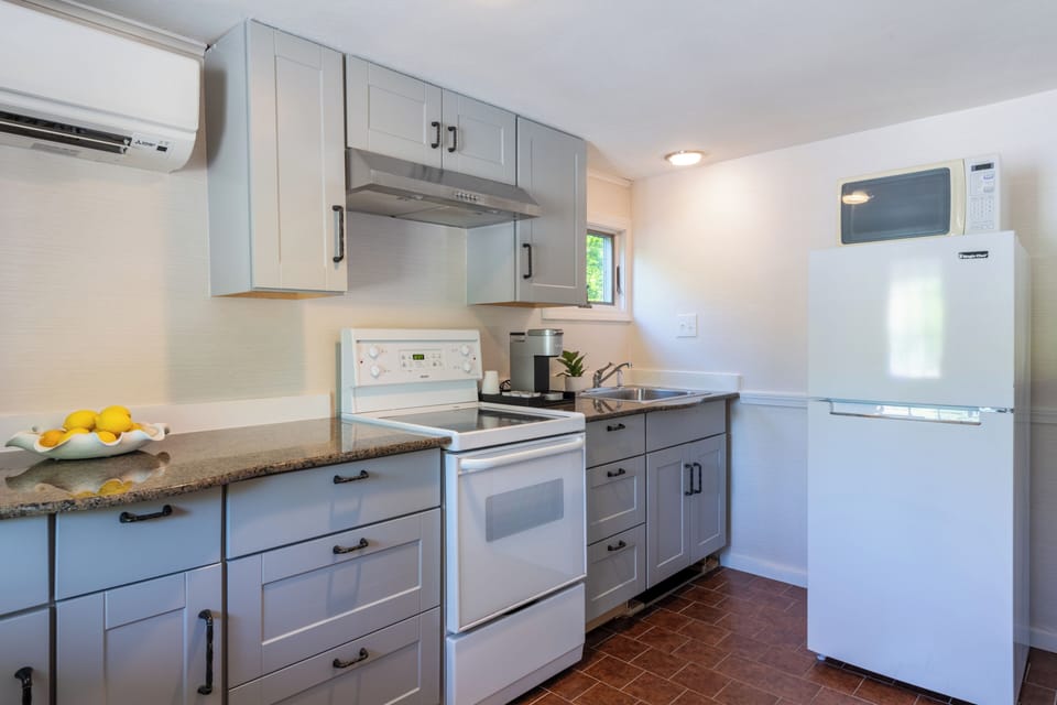 Seagrass Apartment | Private kitchen | Fridge