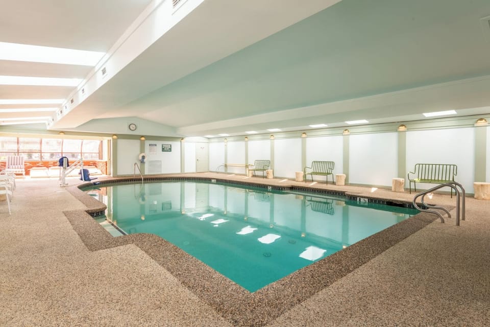 Indoor pool, seasonal outdoor pool, pool umbrellas, sun loungers