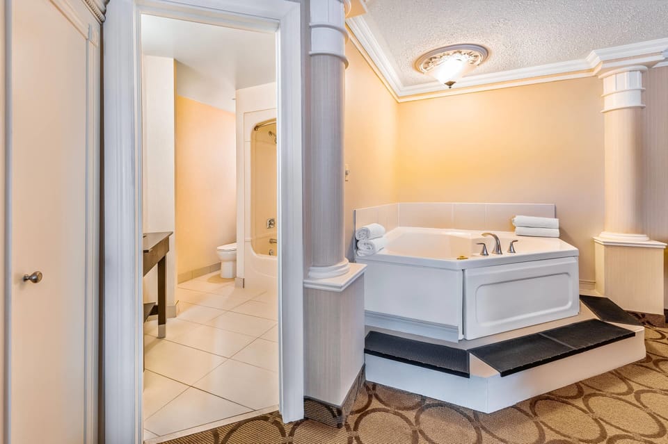 Suite, 1 Queen Bed, Non Smoking (Upgrade) | Premium bedding, pillowtop beds, individually decorated, desk