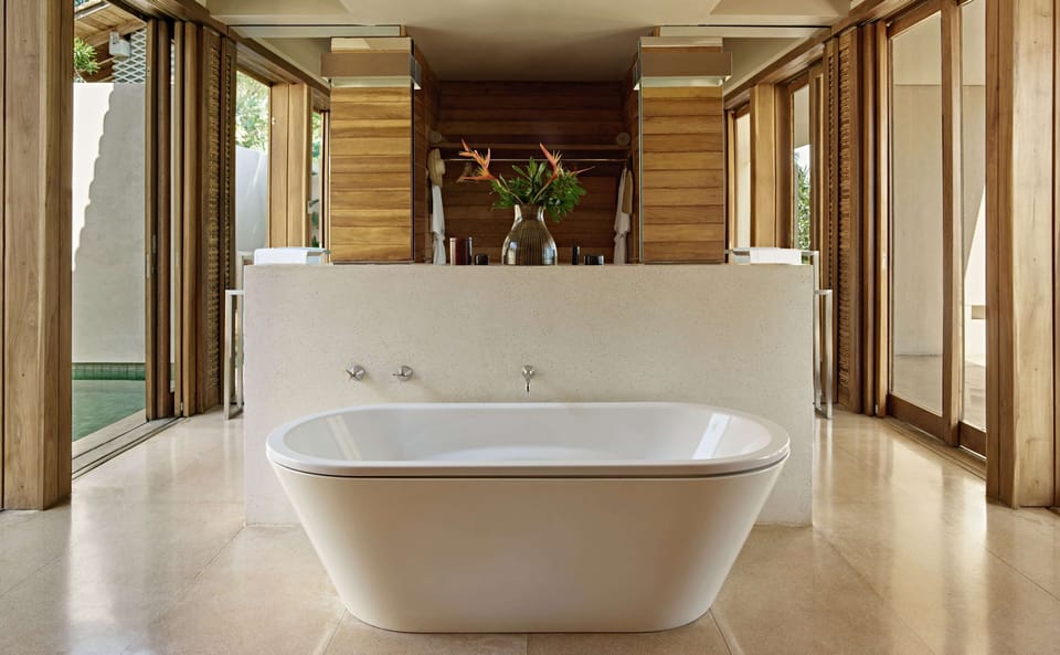 Separate tub and shower, free toiletries, hair dryer, bathrobes