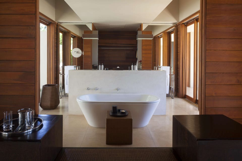 Separate tub and shower, free toiletries, hair dryer, bathrobes