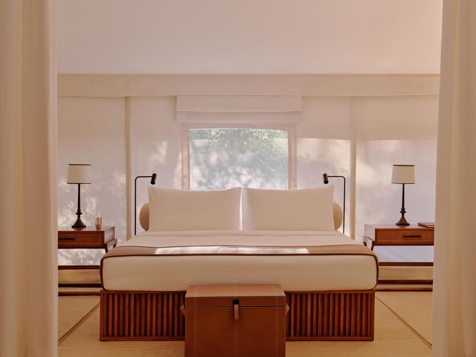 Tented Pool Pavilion | Minibar, in-room safe, desk, laptop workspace