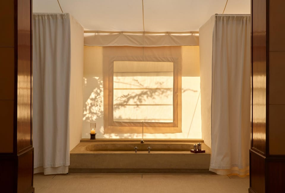 Separate tub and shower, rainfall showerhead, free toiletries