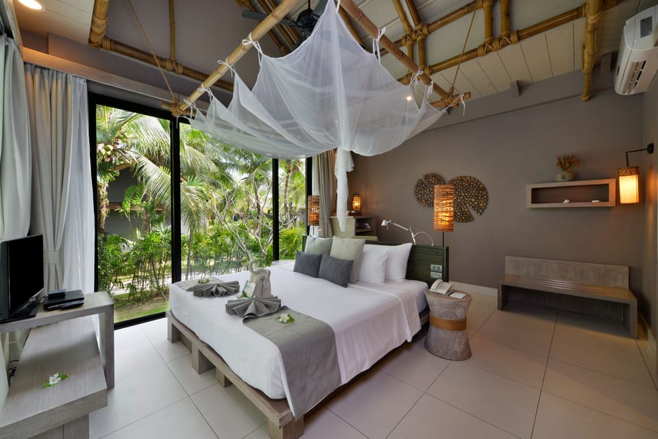 Deluxe Garden Villa | Premium bedding, minibar, in-room safe, blackout drapes