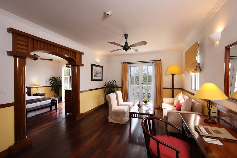 Suite, River View | Minibar, in-room safe, desk, soundproofing