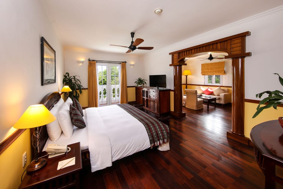 Suite, River View | Minibar, in-room safe, desk, soundproofing
