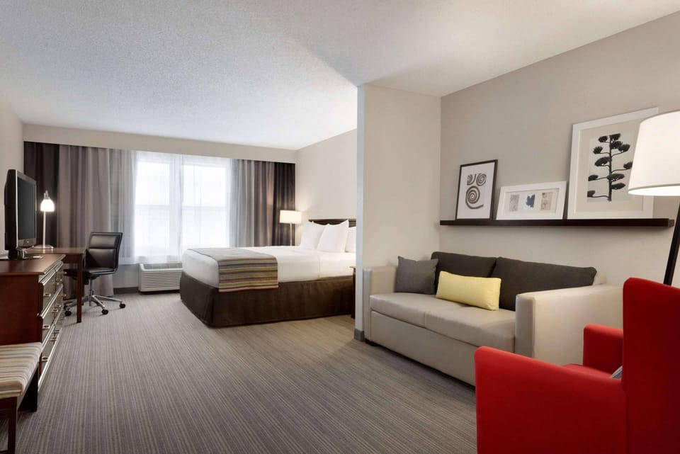 Hypo-allergenic bedding, pillowtop beds, desk, laptop workspace