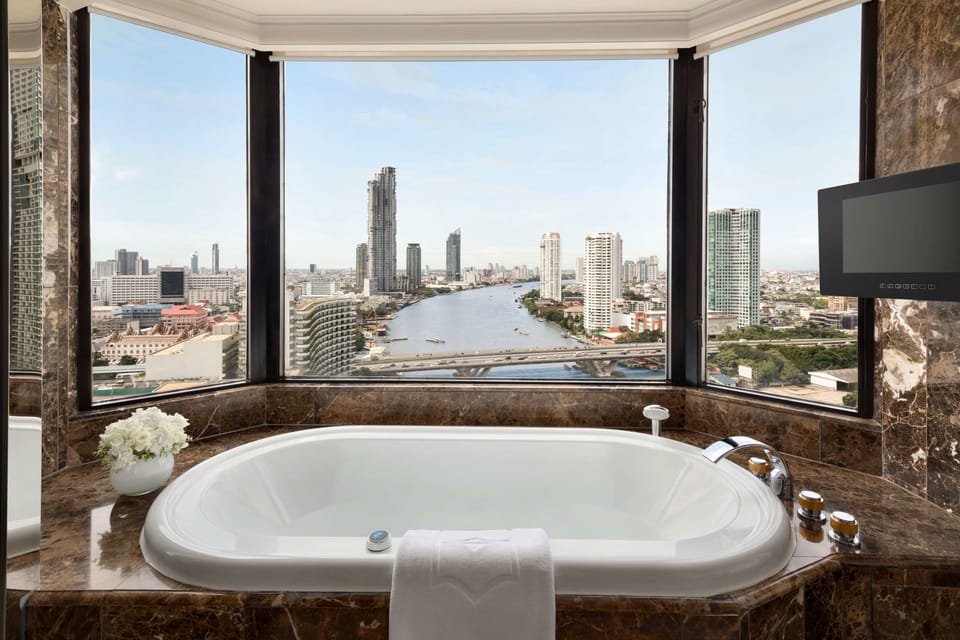 Separate tub and shower, rainfall showerhead, free toiletries
