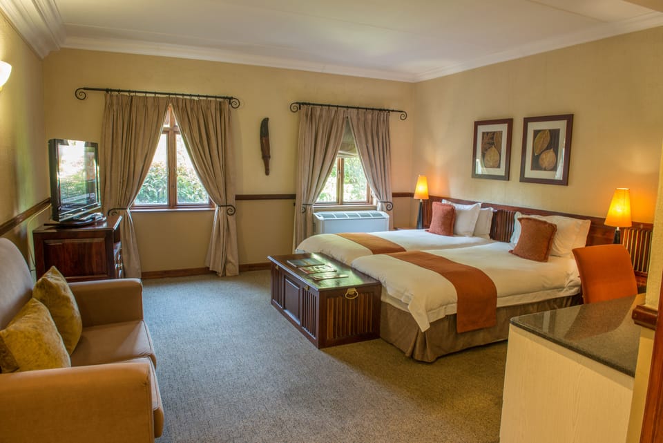 Studio, 2 Twin Beds | Down comforters, minibar, in-room safe, desk