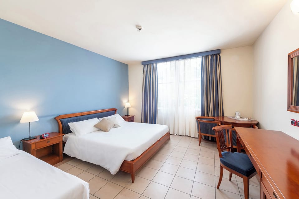 Superior Double Room | Frette Italian sheets, Select Comfort beds, minibar, in-room safe
