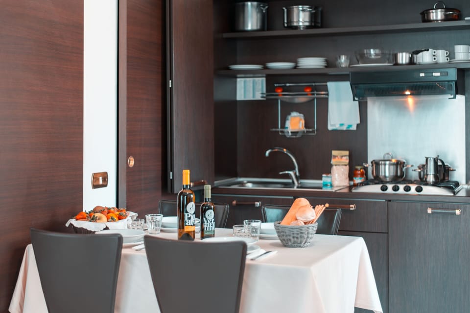 Standard Apartment, 1 Bedroom | Shared kitchen facilities | Fridge, highchair