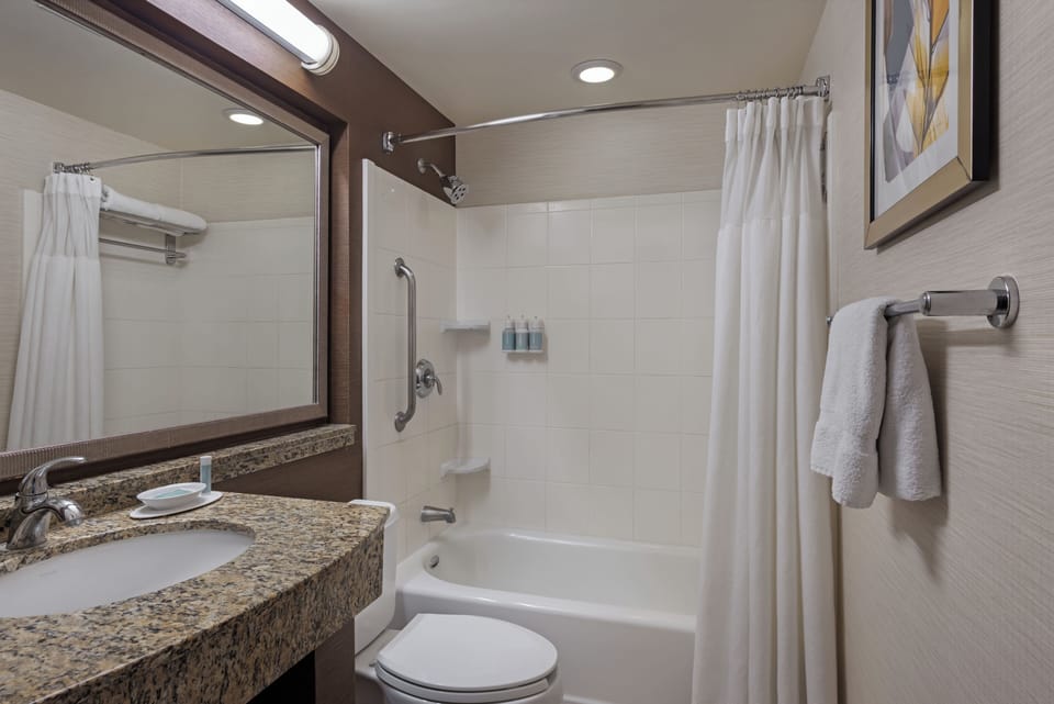 Room, 2 Queen Beds | Bathroom | Combined shower/tub, hair dryer, towels
