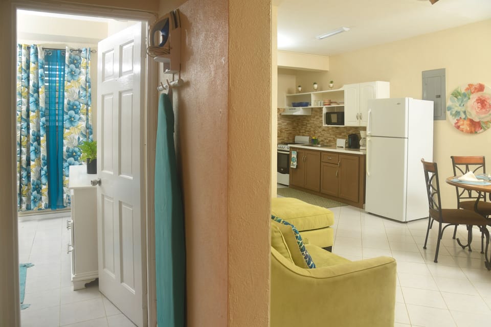 Apartment, 2 Bedrooms | Living area | 36-inch flat-screen TV with cable channels, TV