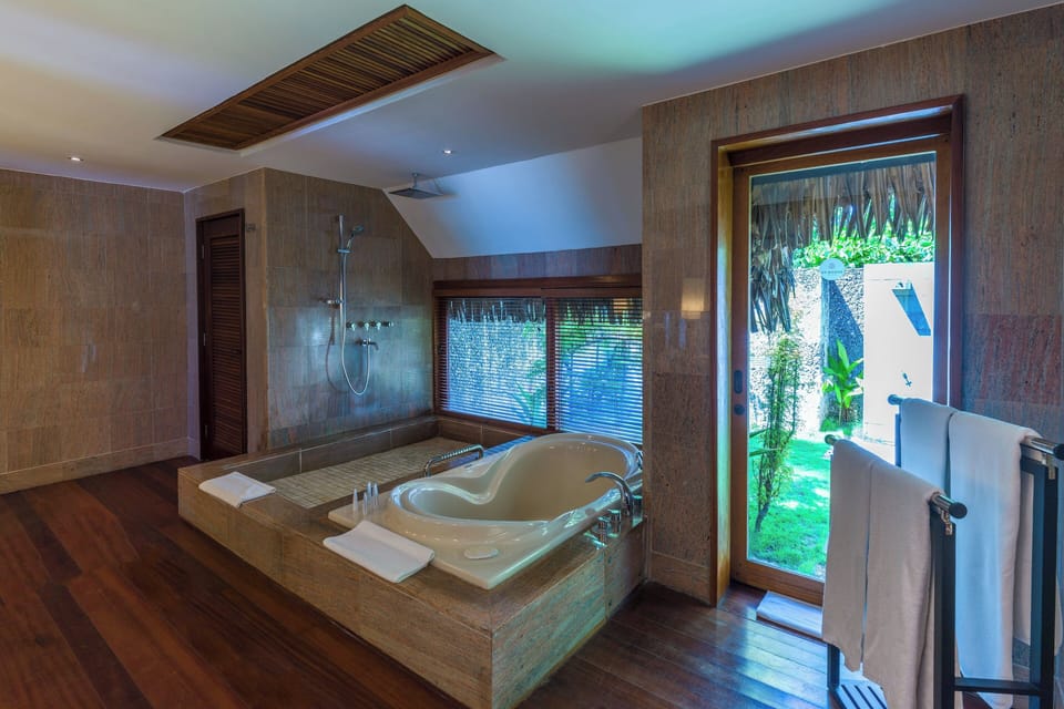 Separate tub and shower, deep soaking tub, rainfall showerhead