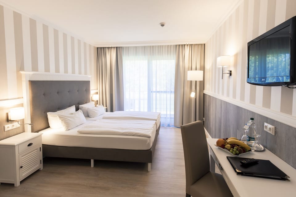 Hypo-allergenic bedding available, minibar, in-room safe, desk