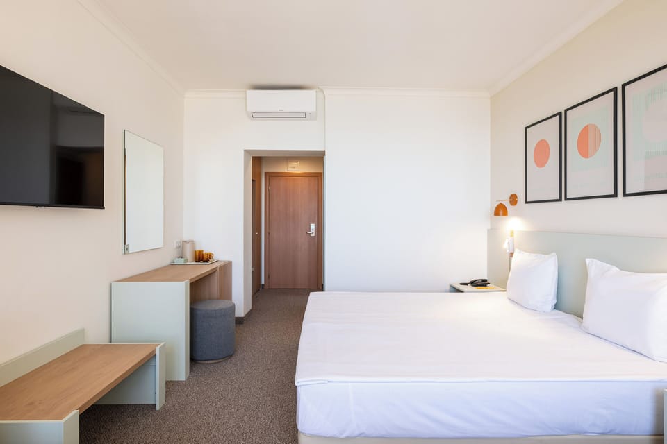 In-room safe, desk, blackout drapes, free cribs/infant beds