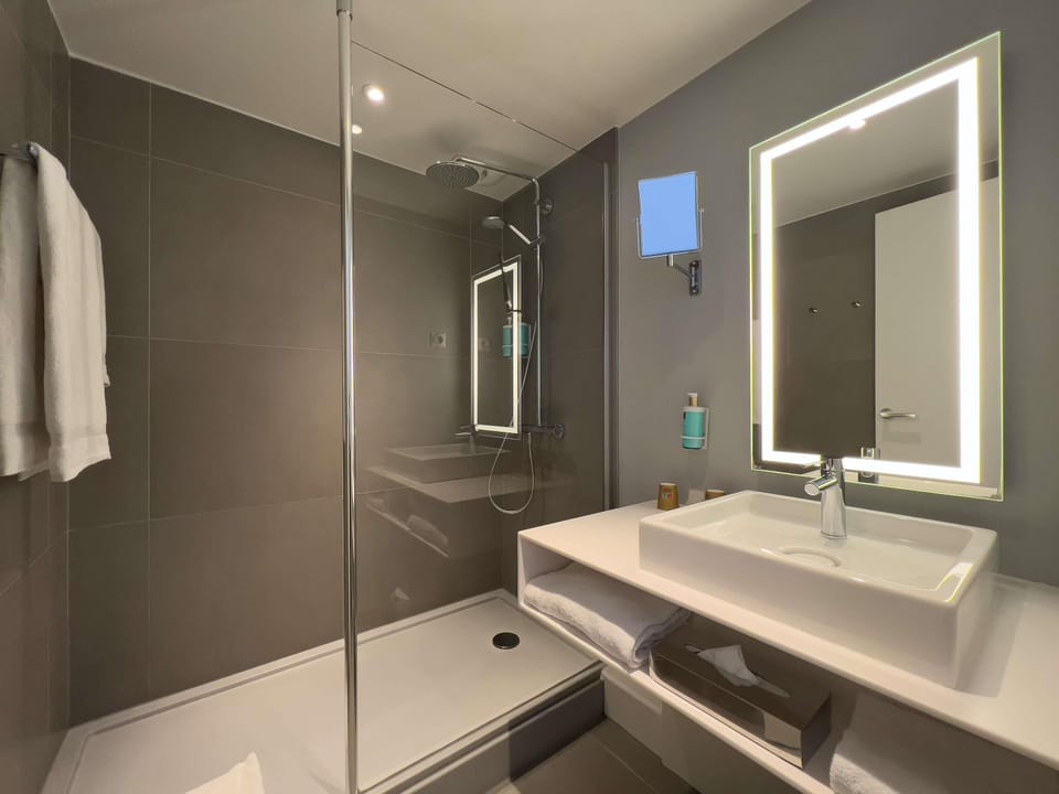 Eco-friendly toiletries, hair dryer, towels