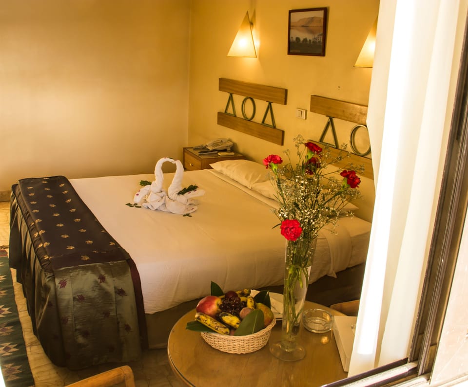 Standard Room, River View | Pillowtop beds, minibar, individually decorated, individually furnished