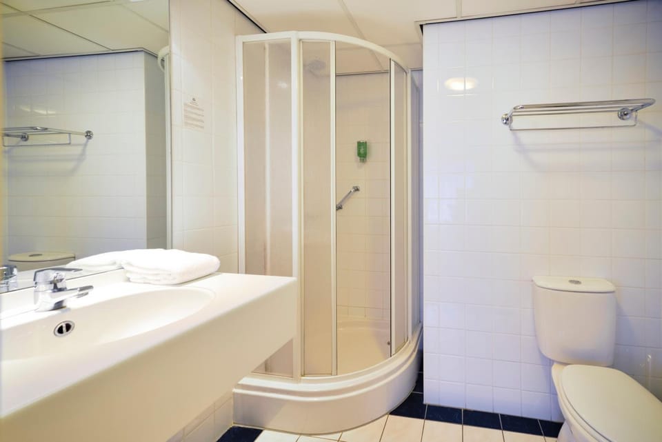Eco-friendly toiletries, hair dryer, towels