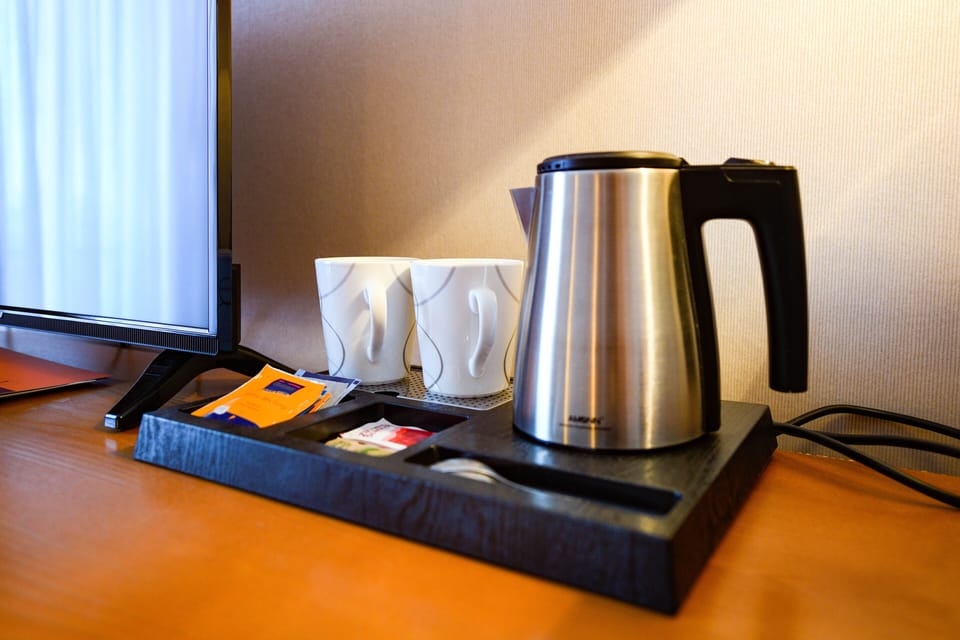 Quadruple Room | Down comforters, minibar, in-room safe, desk