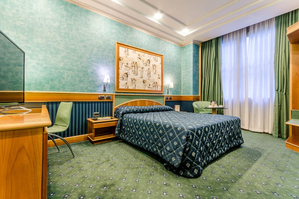 Down comforters, minibar, in-room safe, desk