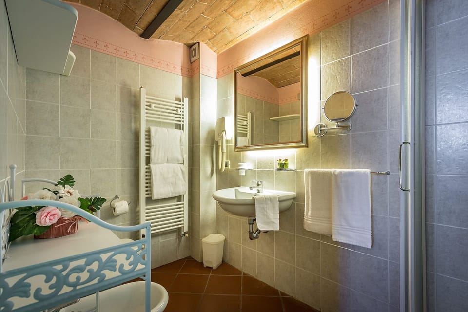 Junior Suite | Minibar, in-room safe, individually decorated, desk