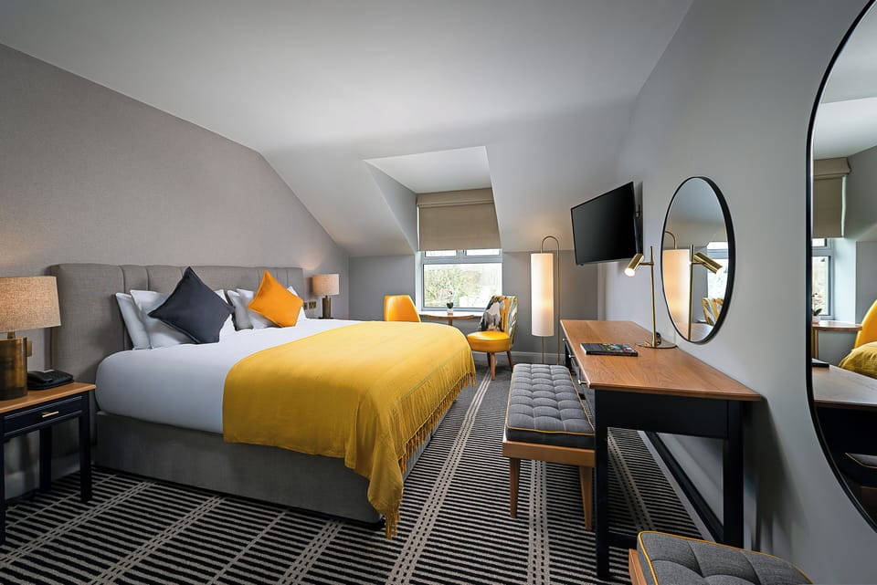 Deluxe Super King Room | Premium bedding, desk, laptop workspace, free WiFi